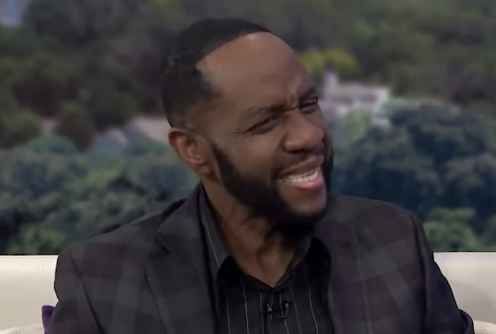 Freddie Jackson smiling during a 2019 television interview