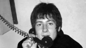A young George Fenton on a backstage telephone at the Apollo Theatre, London, 1969