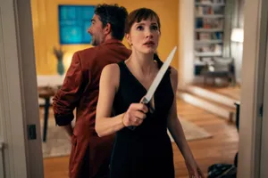 Jessica Chastain holding a kitchen knife in Other Mommy